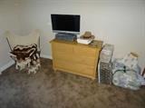 flat screen TV and dresser