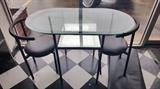 Glass top table and chairs