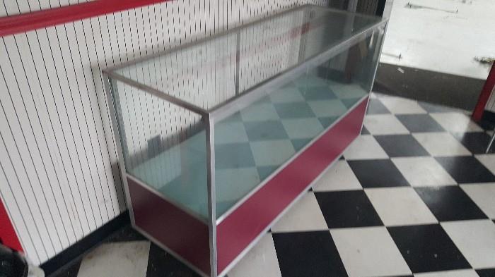 Glass display case 60" long, 21" deep, 35" tall