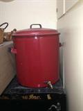 A 100 cup coffee maker in red. There are more.