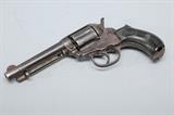 1903 Colt 1877 Lightening double action revolver. 4" barrel stamped with COLT. D.A. 38, 3 separate Patent dates, Sept 19, 1871, Sept 15, 1874 and Jan 19, 1875. Matching serial numbers on the body and trigger guard of 1427754. Checkerboard grips with lots of wear from age, left side grip broken on the lower portion. Mechanism works and is crisp. Blue gray finish, pitting in the gun body and cartridge. No FFL is required to purchase this antique gun. Gun will be shipped in 2 separate shipments per shipping regulations.