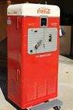 Vintage, fully functional, 1950's Coca-Cola Vendolator 33 dispensing machine.