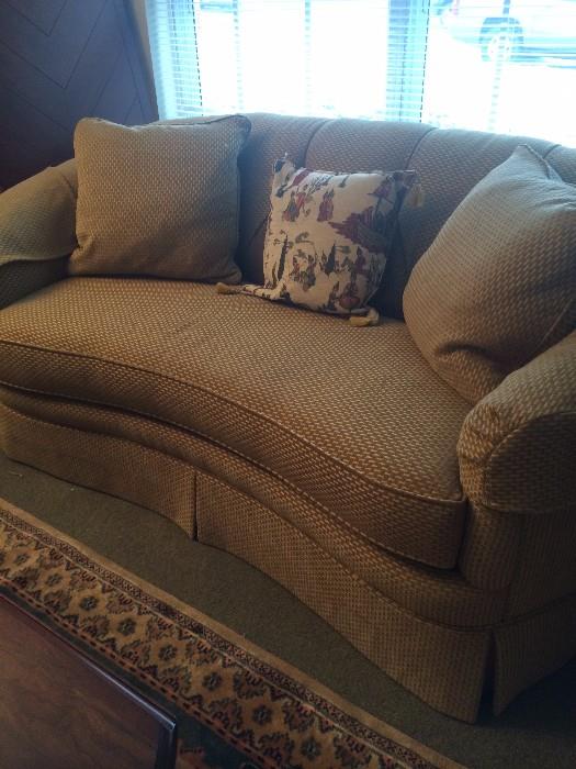 Comfy gold curved sofa