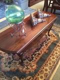Drop-leaf coffee table; gazing ball; wall sconces; 