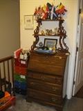 Newer slant front desk/chest, office drawers, plus an ornate shelf