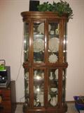 Wood and Curved glass, lighted curio cabinet