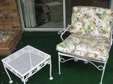 Iron/Metal Table and a Pair of vintage Cushioned Patio chairs.
