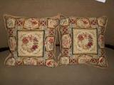 Parlor: A pair of quality needlepoint pillows.