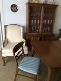 Mid-century ining room table, matching china cabinet. Wing back chair
