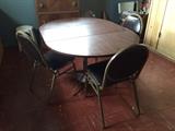 Oval table. Four chairs