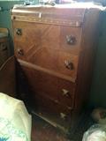 Tall waterfall antique dresser 