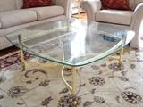 Matching glass and brass coffee table