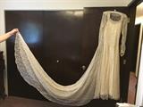 Beautiful antique lace wedding gown.  Excellent condition!