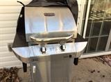 Commercial gas grill on back patio