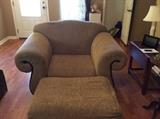 Very large chair with marching automan. Beige in color - good condition