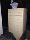 Narrow five-drawer chest.