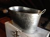 Galvanized steel tub.