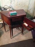 Mahogany Singer sewing machine table.