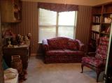 love sofa with matching chair. Window treatments also.