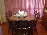 Dining table with six chairs. 80" long with 2 leaves
