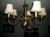 Dining room chandelier.  5 bulb.  you take down. a few thru the house