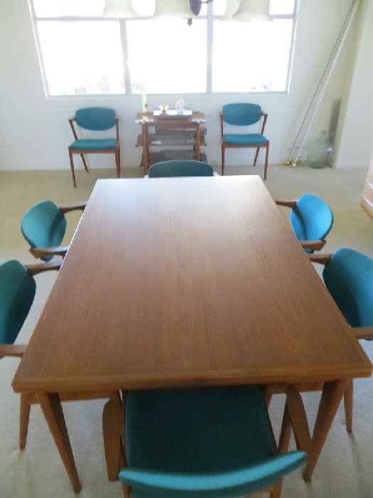 Niels Otto Moller Dining Table w/Dutch extendable leaves. Circa 1960s.  See photos for chairs.