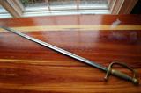 Civil War Sword by Ames MFG. Co. In Chicopee, Mass. - This Sword Has A Brass Handle With Leather Wrapping Where The Blade Meets The Handle -- Inspector Marks And The Year 1852 Are On The Blade - Resembles Very Closely A Foot Officers Or General Officers Sword - Value From $1,500 - $2,000