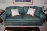 Pennsylvania House Two Cushion Sofa With Two Back Cushions All Removable Also Includes Two Matching & Two Complimentary Accent Pillows--Rolled Arms & Skirted Base--Made In USA--Steeped In Tradition Of Excellence That Goes Back More Than 120 Years, Pennsylvania House Remains An Industry Standard For Quality & Craftsmanship--Sofa Has Some Sun Exposure