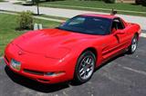"All This Baby Needs Is A Quart Of Oil & A Racetrack!" - 0 - 60 in 3.9 Seconds -- 2002 Corvette ZO6 With A Torch Red Exterior & Black & Red Seats - Six-Speed Manual Transmission - This Beauty Boasts A 5.7 L 405 HP Engine - The Owner Has Kept This Amazing Vehicle In A Garage And Barely Driven It - Actual Milage Tops Out At A Super-Low 2450 Miles!! - This Is Truly Like New - Features Include 6-way power driver seat, Driver seat with manual adjustable lumbar support, Height adjustable driver seat, Leather, Bucket front seats, Remote power door locks, Power mirrors, Heated mirrors, 2 one-touch power windows, Tachometer, Trip computer, Cruise control, Retained accessory power, Speed-proportional power steering, 12V front power outlet(s), Tilt-adjustable steering wheel, Dual zone climate controls - driver and passenger, Front reading lights, Leather trim on shift knob, Leather steering wheel, Front floor mats, Bose premium brand speakers, 4 total speakers, AM/FM in-dash single CD player ster