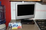 Under-the-cabinet mounted flat screen tv
