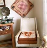 Mid Century Modern white vinyl chair with sleek lines