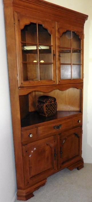 Vintage Temple-Stewart maple corner cabinet.