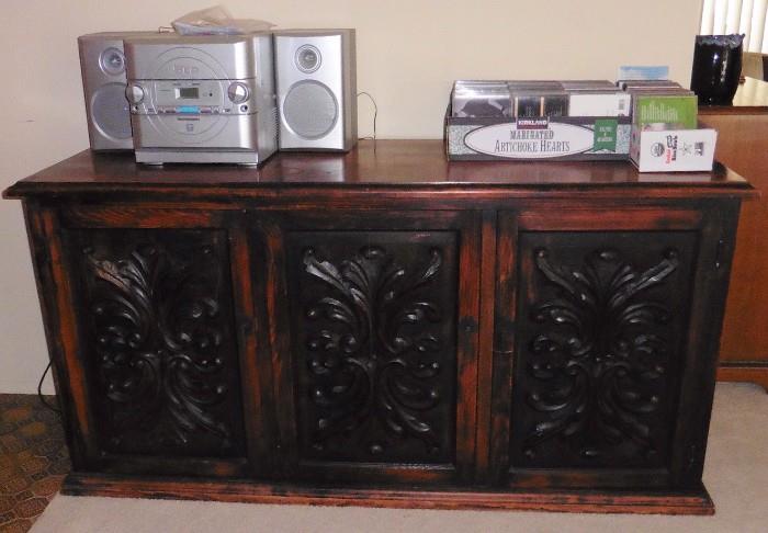 Mediterranean cabinet/buffet, CD's, small CD player with speakers