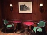 One of several Piranesi Architectural Engravings, Bar Tables, and Chairmaster Chairs.