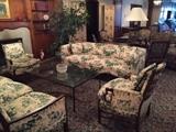French Provincial Furniture upholstered in green and cream toile, a coffee table made out of an old gate.