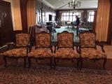 A set of four French Provincial Fauteuils.