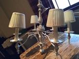 Several White Chandeliers.