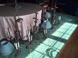 Four Metal Chandeliers.