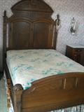 This gorgeous bed has a dramatic seven-foot headboard.