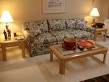Lammerts sofa and art deco influenced contemporary coffee table and end tables