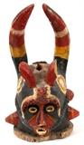 AFRICAN WOOD & POLYCHROME DOUBLE HELMET MASK WITH HORNS, NIGERIA, H 22 1/2", W 15"