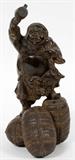 CHINESE BRONZE FIGURE ON RICE BALES, H 9 1/4"