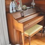 Beautiful 1960s Kimball Upright Spinet Piano with original piano stool.  There are music books available as well as sheet music.