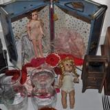 Vintage doll case, dolls, doll clothing; cast "copper" mail box bank, crystal carafes.