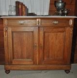 Gorgeous antique marble-topped buffet with two drawers and cabinets.  Drawers are felt-lined to protect silver.