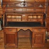 Fabulous antique walnut desk with barrel/cylinder top, opened.