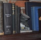 Assorted vintage books, marble pair of bookends.