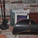 Fireplace set, large format books, black/brass firewood caddy.