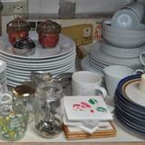 Sets of dishes, tiles, platters, Seal-a-Meal, marbles, glassware.
