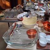 Lots of kitchen items -- Melamine, Le Creuset, cake pans, vases, pottery, Corning Ware, Pyrex. bean pots, cast iron, glass, pots and pans, copper, casserole dishes, china, copper, pottery, plates, cups/saucers, etc.